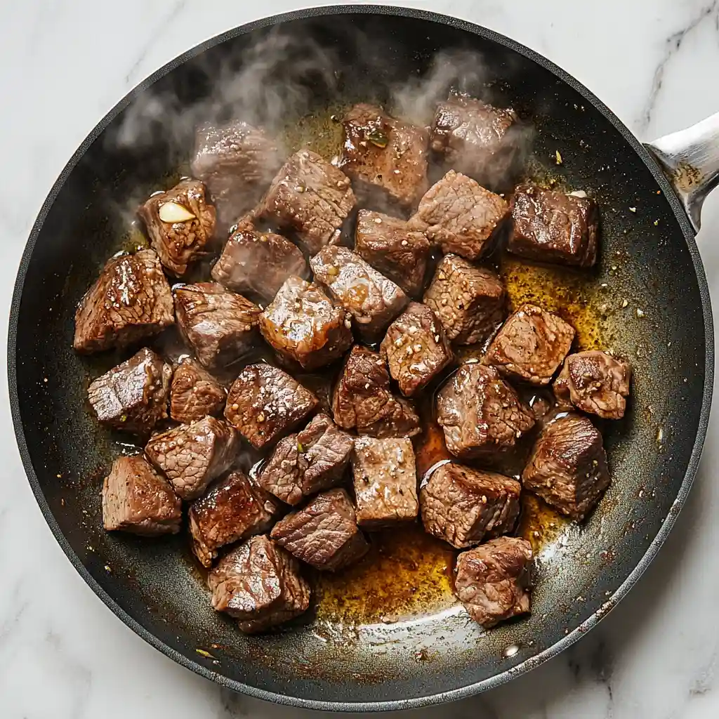 Low FODMAP slow cooker fennel beef stew 2 Browning beef cubes in skillet for Low FODMAP slow cooker fennel beef stew